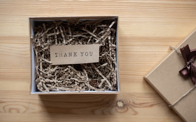 a small thank you card in a box