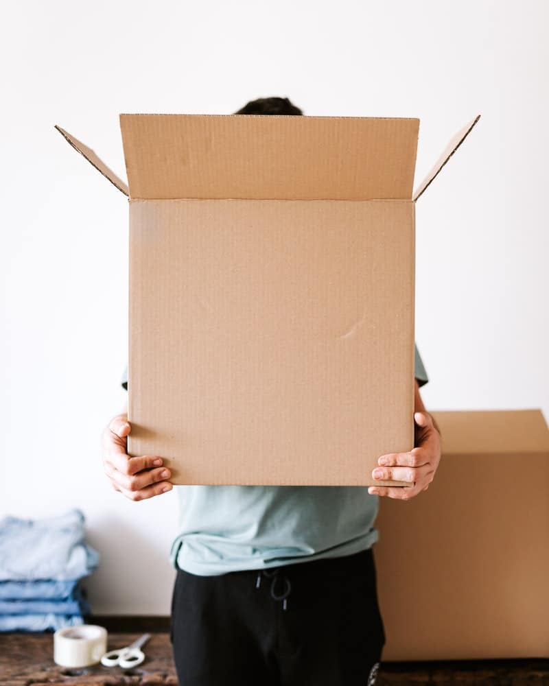 a person holding an open box
