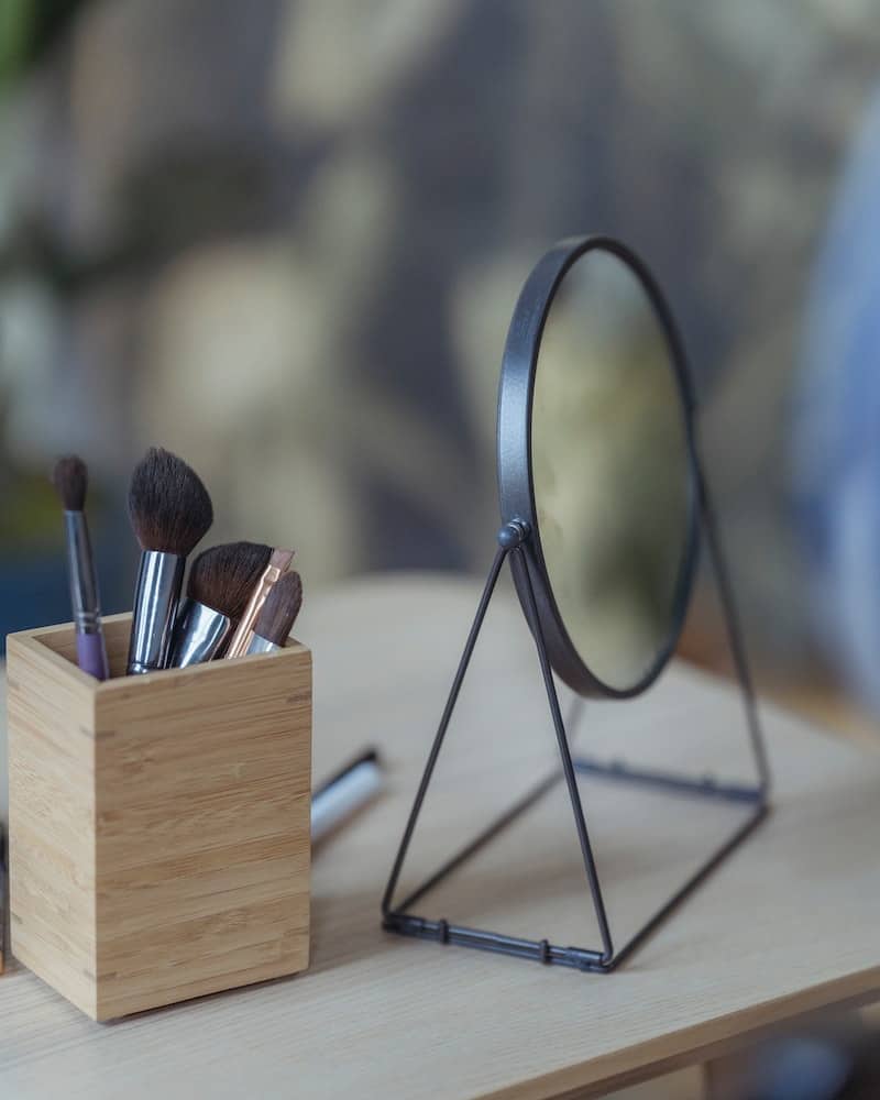 makeup tools and a mirror