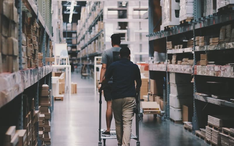 man walking in a warehouse
