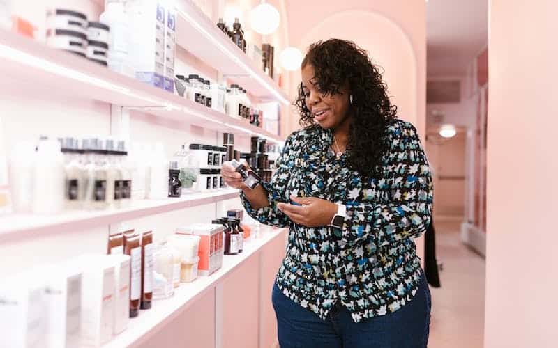 woman choosing beauty products
